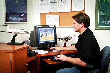 Stephen Wehner gets ready to search for parts in the Cirrus inventory